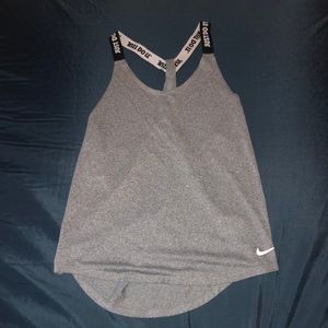Grey Nike racerback tank top in size s.